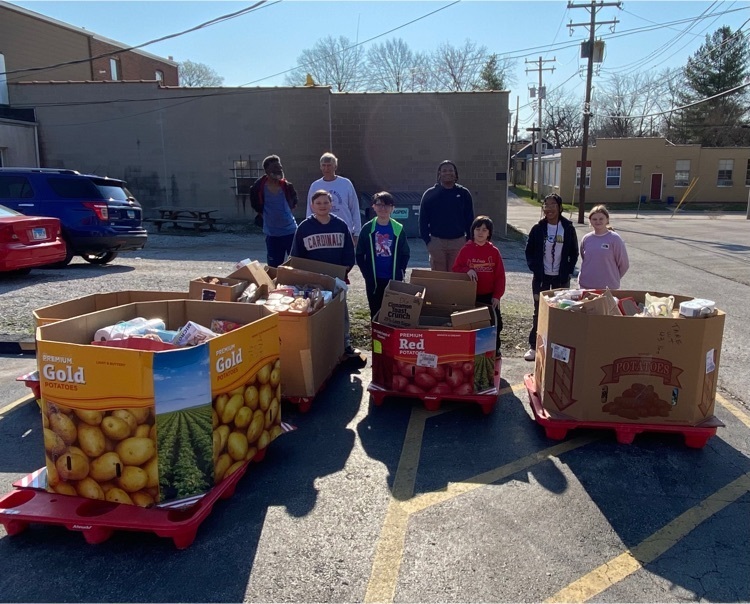 Douglas 6th graders assist with unloading items from our 2023 Drive Away Hunger Food Drive.